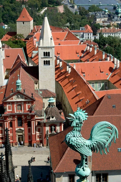 Copper rooster on roof of Saint Vituss Cathedral with Saint Georges Basilica