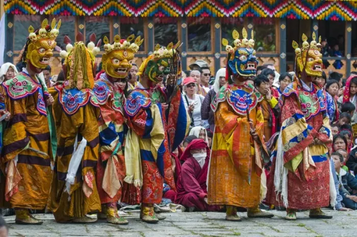 Framed Print : Costumed dancers at religious festivity with many visitors, Paro Tsechu, Bhutan Framed Print : Costumed dancers at religious festivity with many visitors, Paro Tsechu, Bhutan