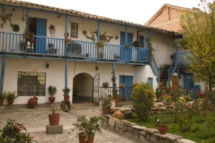 Framed Print : Courtyard with blue railing and many flower pots, Cuzco, Peru Framed Print : Courtyard with blue railing and many flower pots, Cuzco, Peru