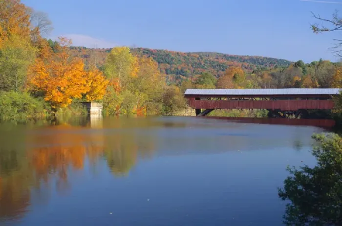 Framed Print : Covered bridge over the Ottauqueche River in Vermont. covered bridge, ottauqueche river