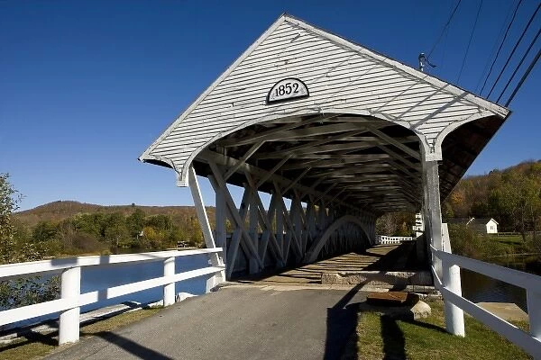 The covered bridge over the Upper Ammonoosuc River in Groveton, New Hampshire. Wausau Paper Mill