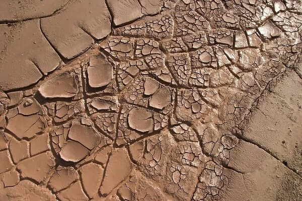 Cracked mud in desert during drought, Navajo reservation, near Seba Dalkai, Arizona