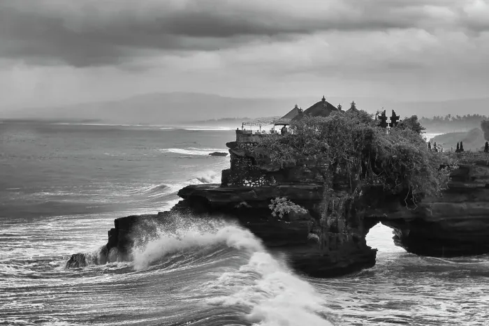 Framed Print : Crashing waves on the lava rock shoreline of Tanah Lot Temple, Bali, Indonesia