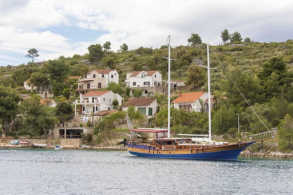 Croatia, Brac, Bobovisca. Tour boat at anchor