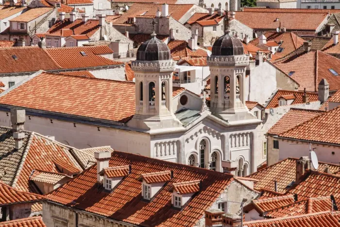 Framed Print : Croatia. Dalmatia. Dubrovnik. Church among red terra cotta tile roofs in the old town of