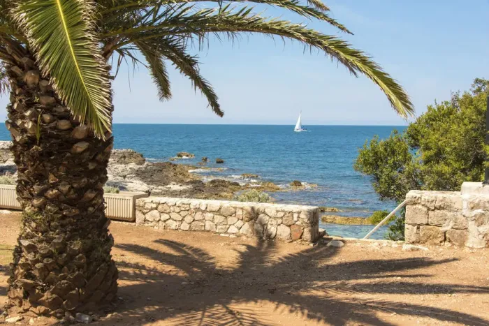 Framed Print : Croatia, Dubrovnik. Lokrum Island. Sailboat passes in calm Adriatic Sea
