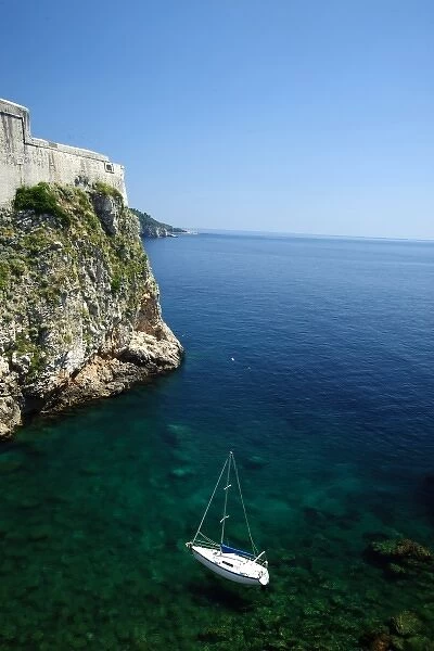 Croatia, Dubrovnik. Sailboat drifts in the summer sun in the Adriatic Sea