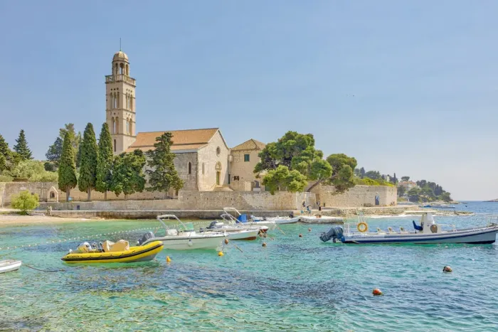 Framed Print : Croatia, Hvar. Franciscan monastery and boats in harbor Framed Print : Croatia, Hvar. Franciscan monastery and boats in harbor