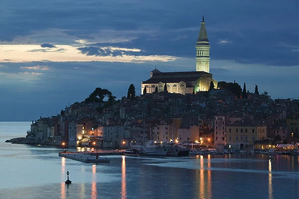 CROATIA, Istria, ROVINJ. ROVINJ harbor view with Cathedral of St. Euphemia  /  Evening