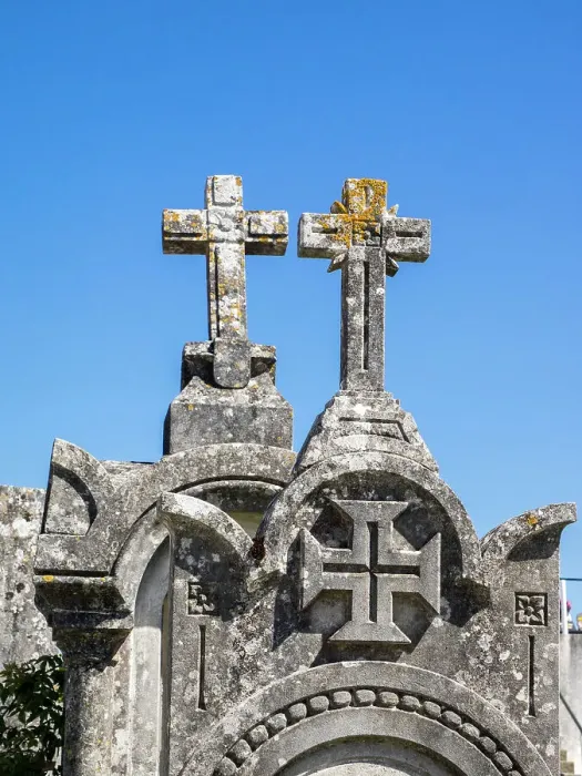Framed Print : Cross at the top of an ancient gravestone in the cemetery at the Castelo de Ourem, a Portuguese National Monument