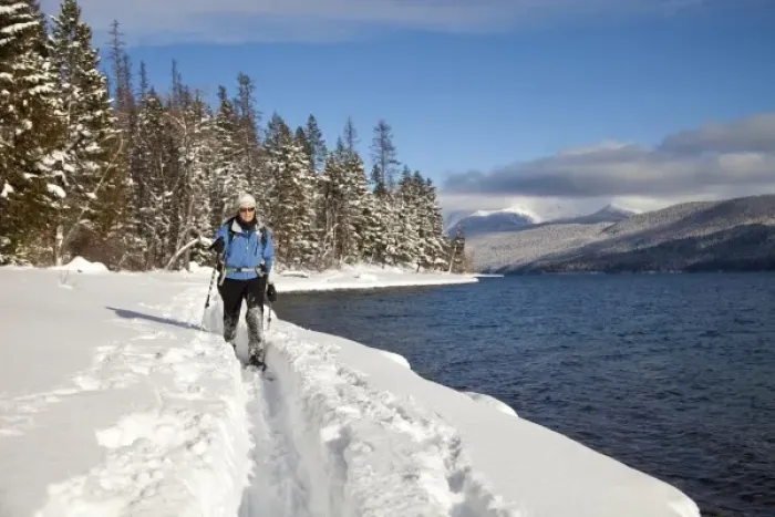 Framed Print : Cross country skiing along Lake McDonald in Glacier National Park in Montana (MR) Framed Print : Cross country skiing along Lake McDonald in Glacier National Park in Montana (MR)