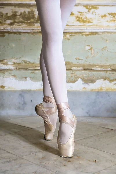 Cuba, Havana. Ballet position of ballerinas legs and feet