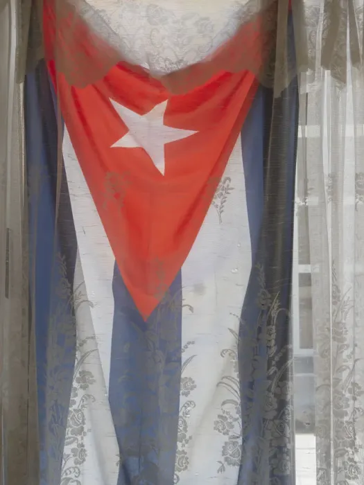 Framed Print : Cuba, Havana, Cuban flag in window Framed Print : Cuba, Havana, Cuban flag in window