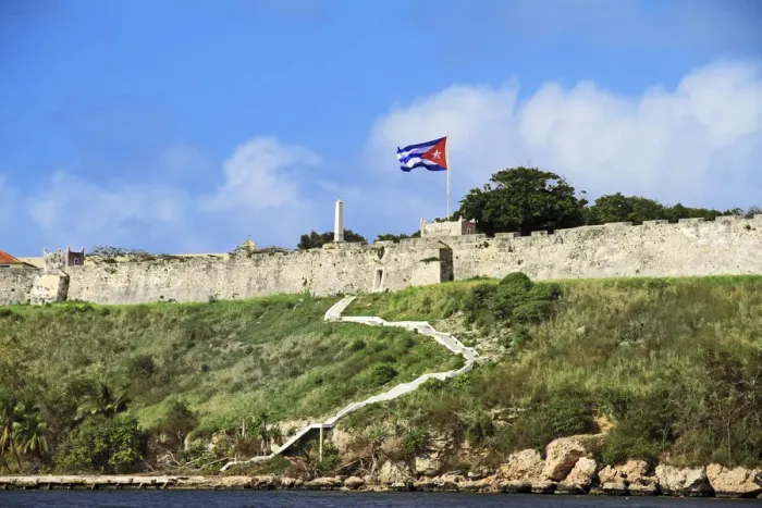 Framed Print : Cuba, Havana. Fortress wall and Cuban flag at San Carlos de la Cabana fortress in Framed Print : Cuba, Havana. Fortress wall and Cuban flag at San Carlos de la Cabana fortress in