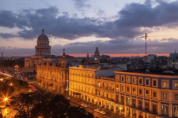 Cuba, Havana. Twilight over the city with the capitol and other historical buildings