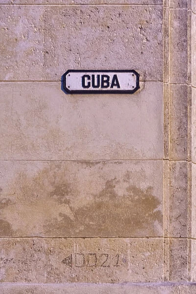 Cuba street sign on pink wall in Old Havana, La Habana Vieja, Cuba