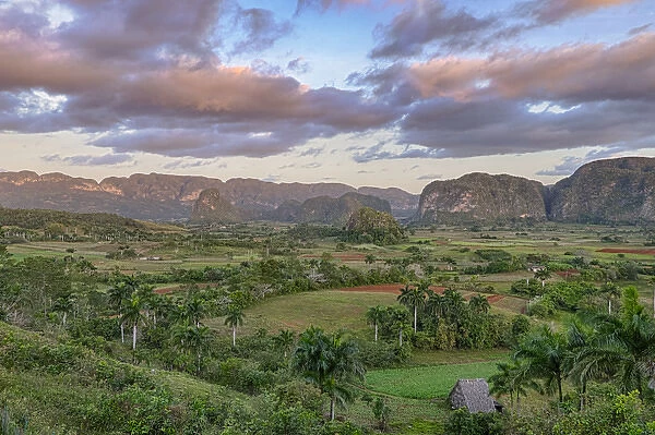 Cuba, Vinales. Dawn breaks over the valley of Vinales, a verdant farming region that grows tobacco