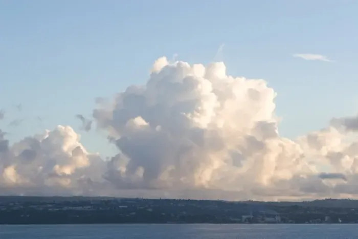 Framed Print : Cumulus clouds form over the Caribbean Island of Barbados