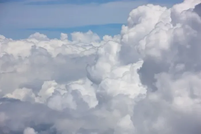 Framed Print : Cumulus clouds as seen from high above the tropical coastline of Costa Rica