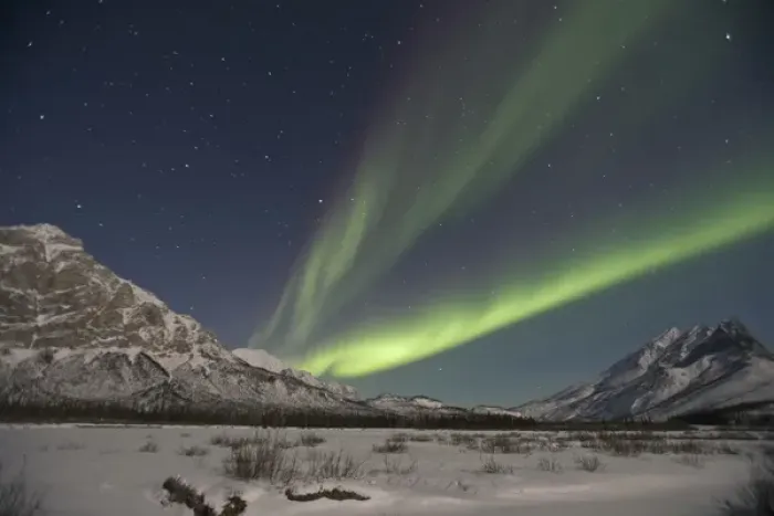 Framed Print : Curtains of green aurora borealis fill the sky over high peaks of the Central Brooks