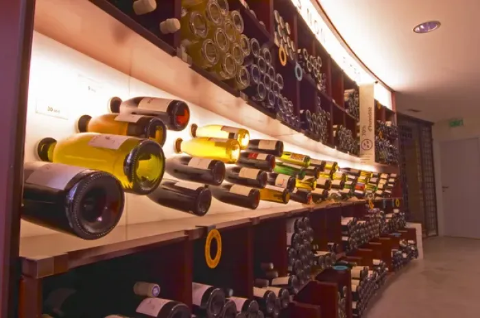 Framed Print : A curved display of bottles. Backlit The Lavinia wine shop in Paris. Probably Framed Print : A curved display of bottles. Backlit The Lavinia wine shop in Paris. Probably