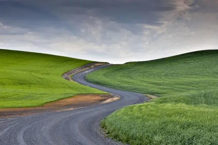 Framed Print : Curved gravel road through wheat and pea fields near Kamak Butte, Eastern Washington Framed Print : Curved gravel road through wheat and pea fields near Kamak Butte, Eastern Washington