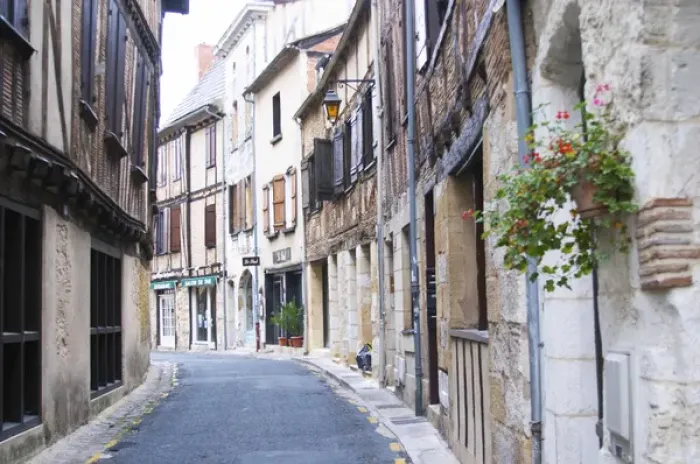 Framed Print : A curving street in the old town with old stone and wooden beam houses. Bergerac Framed Print : A curving street in the old town with old stone and wooden beam houses. Bergerac