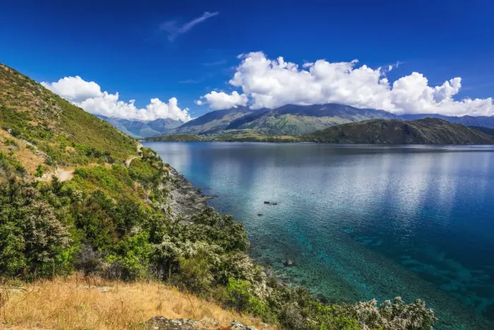 Framed Print : Cycling the shore of Lake Wanaka, Otago, South Island, New Zealand