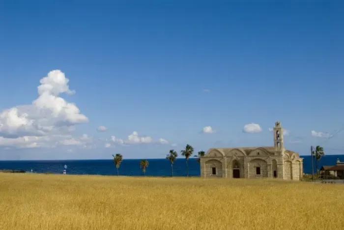 Framed Print : Cyprus, Karpas peninsula, Ayios Thyrsos church and the sea