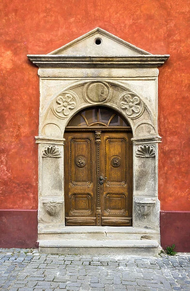 Czech Republic, Cesky Krumlov. Ornate doors and arch