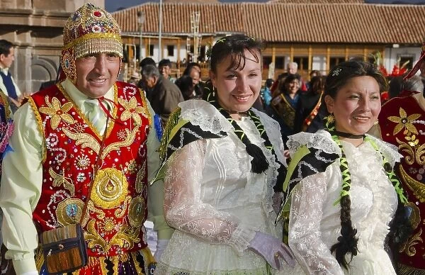 Dancers in bright beads and traditional dress in Main Square in Cusco Cuzco Peru South America