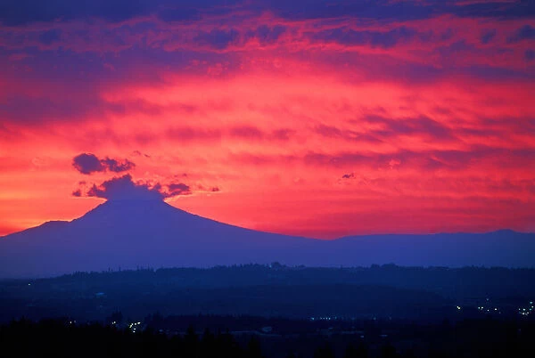 Deep red sunrise and explosion-like clouds over Mt Hood, Oregon