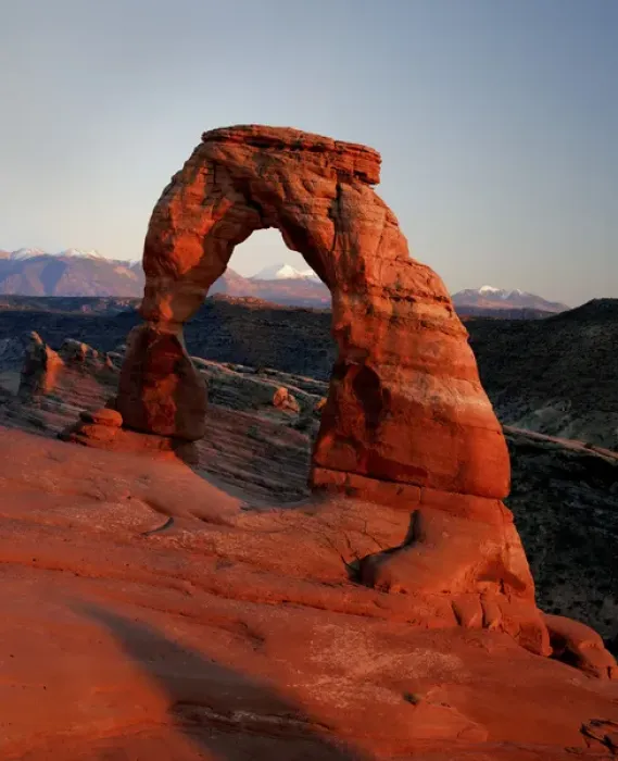 Framed Print : Delicate Arch at Sunset with snow covered La Sal mountains in the background Framed Print : Delicate Arch at Sunset with snow covered La Sal mountains in the background