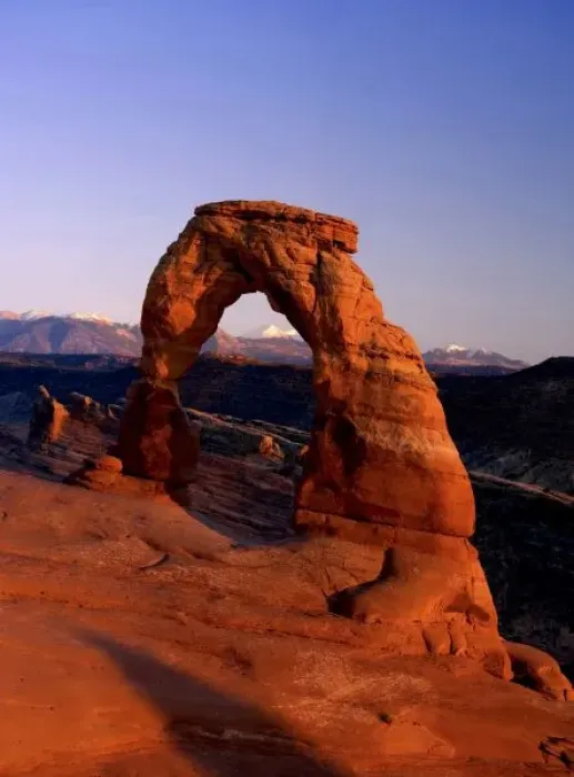 Framed Print : Delicate Arch at Sunset with snow covered La Sal mountains in the background Framed Print : Delicate Arch at Sunset with snow covered La Sal mountains in the background