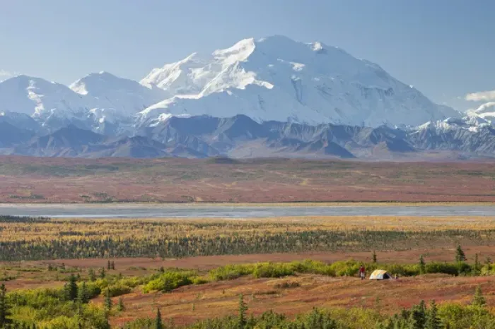 Framed Print : Denali National Park, Alaska, Mt. McKinley towers behind a camper and his tent Framed Print : Denali National Park, Alaska, Mt. McKinley towers behind a camper and his tent