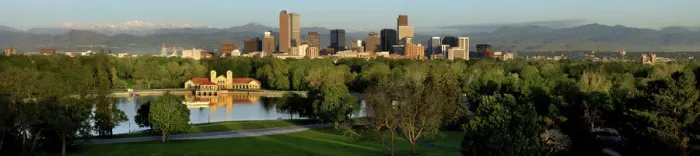 Framed Print : Denver skyline glistens in front of the Rocky Mountains