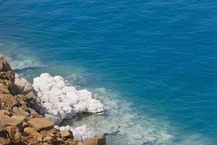 Framed Print : Deposit of salt and gypsum by the cliff in Dead Sea, Jordan