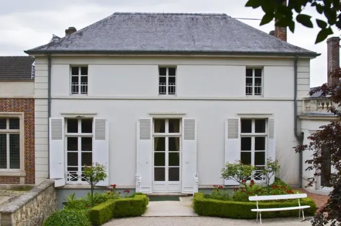 Framed Print : The Deutz building seen from the garden behind the main house with red roses Framed Print : The Deutz building seen from the garden behind the main house with red roses