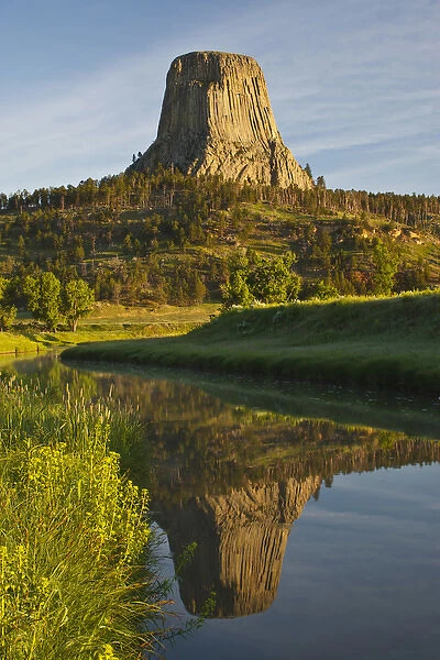 Devils Tower National Monument, Wyoming, reflected in Belle Fourche River at sunrise