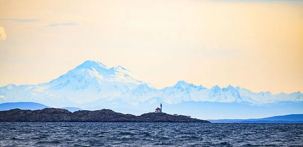 Discovery Island Lighthouse, Victoria, BC against Mt. Baker in WA