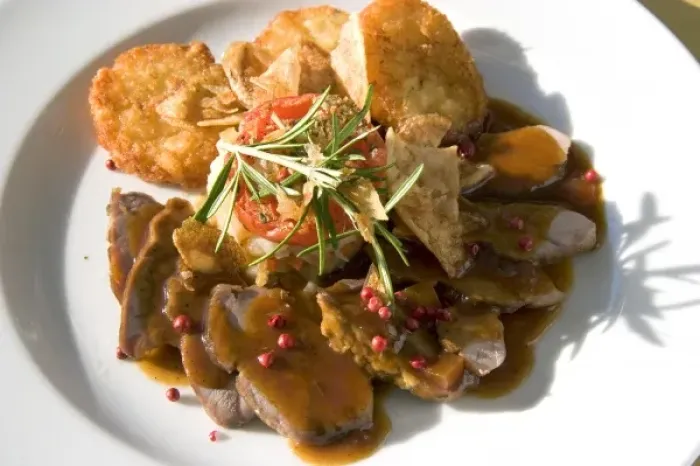 Framed Print : A dish of pork tenderloin and potato at a restaurant near Le Mont Saint Michel in