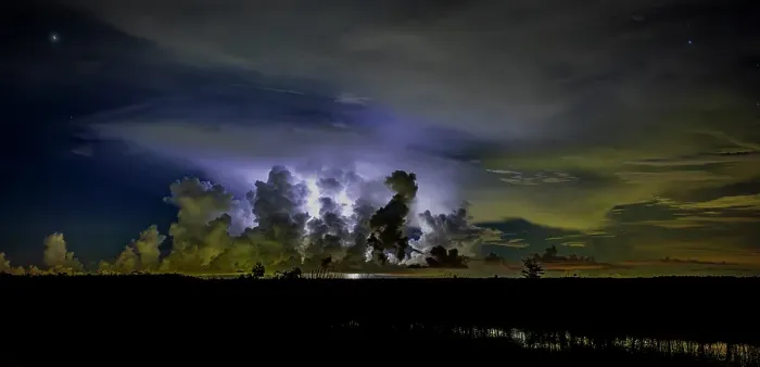 Framed Print : A distant thunder storm and sky draws contrast to the dark Big Cypress prairie Framed Print : A distant thunder storm and sky draws contrast to the dark Big Cypress prairie