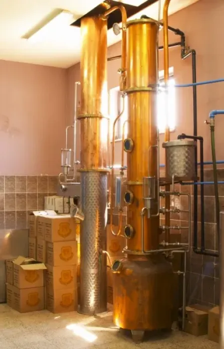 Framed Print : Distillation machine still with steel and copper boiler and column to make grape juice spirit Framed Print : Distillation machine still with steel and copper boiler and column to make grape juice spirit