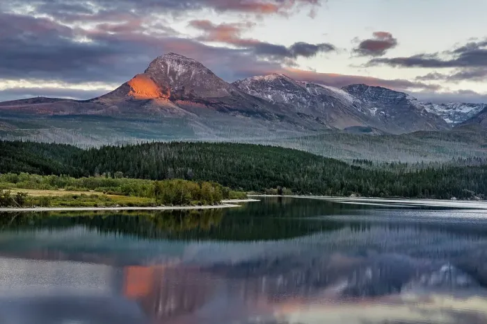 Framed Print : Divide Mountain catches alpenglow light at sunset over St. Mary Lake in Glacier National Park, Montana, USA Framed Print : Divide Mountain catches alpenglow light at sunset over St. Mary Lake in Glacier National Park, Montana, USA