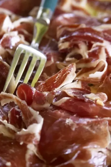 Framed Print : Domaine de Nidoleres. Roussillon. A plate of dry cured ham with a serving fork. France