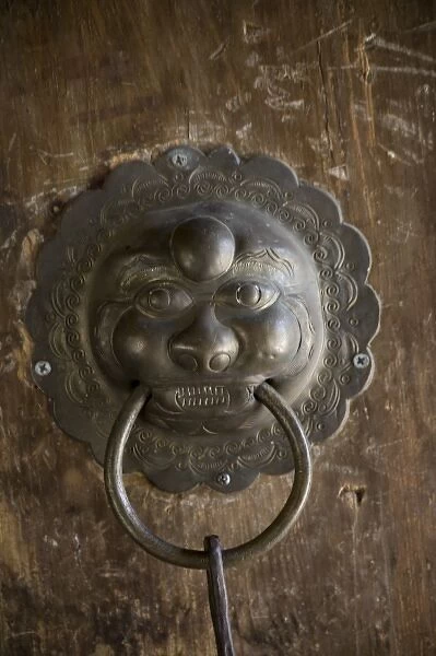 Door knocker design, Naxi -temple, Lijiang. V