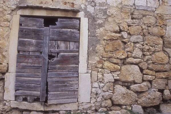 Door and rock wall detail. Vis Town. Vis Island. Croatia