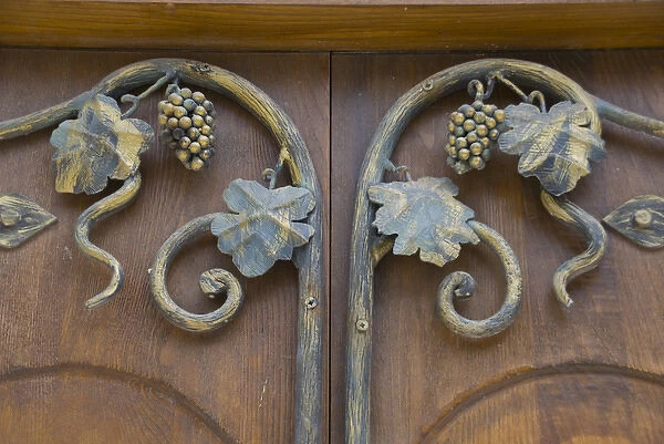 Detail at a door of wine and snakes, the Motsameta monastery near Kutaisi, Georgia