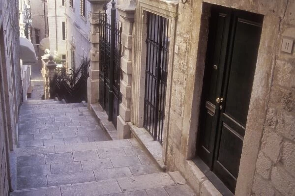 Doors to many homes line the narrow street in a residential area of Old Town Dubrovnik