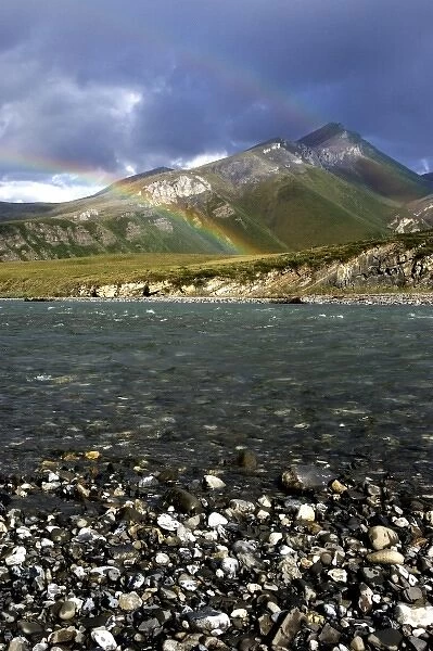 A double rainbow arches over the Kongakut river landcapse - Arctic National Wildlife